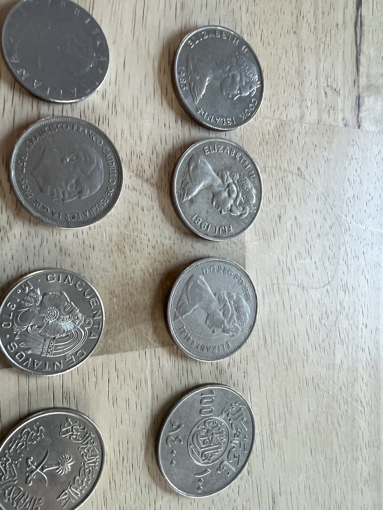 Assorted foreign coins. 26 Coins In Total