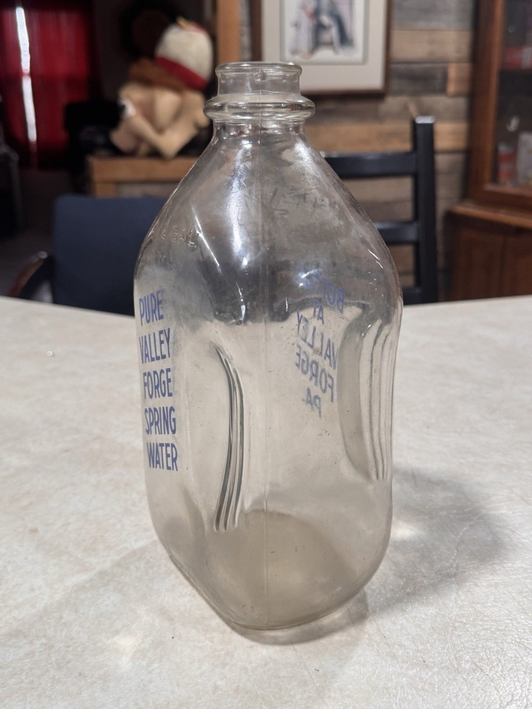 vintage glass spring water bottle