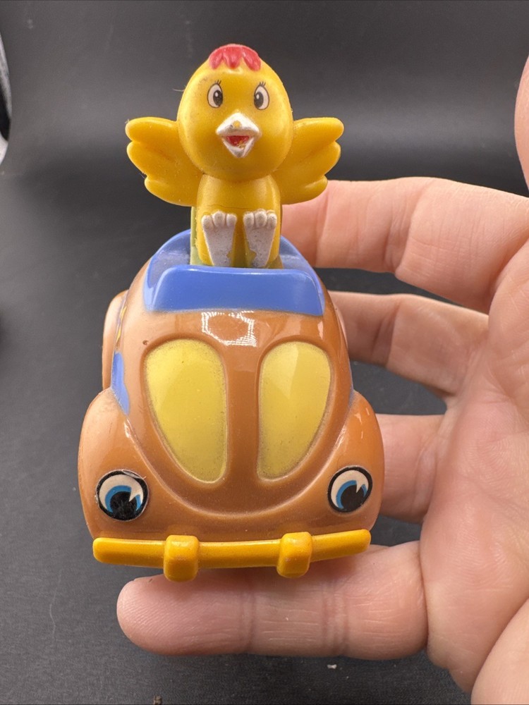 Chick Rides a Compact Car Pull Release Toy, 2.5” tall
