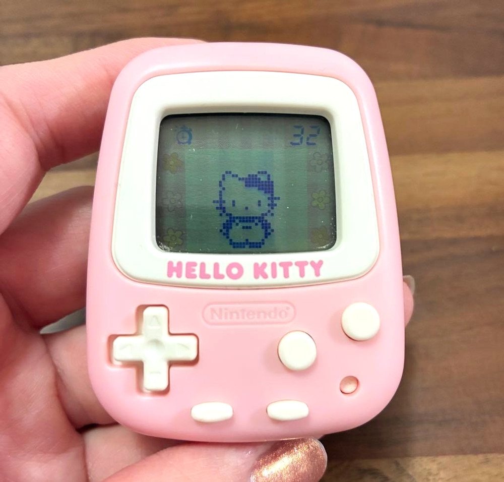 Used Hello Kitty Nintendo Pedometer Handheld Game Console Sanrio