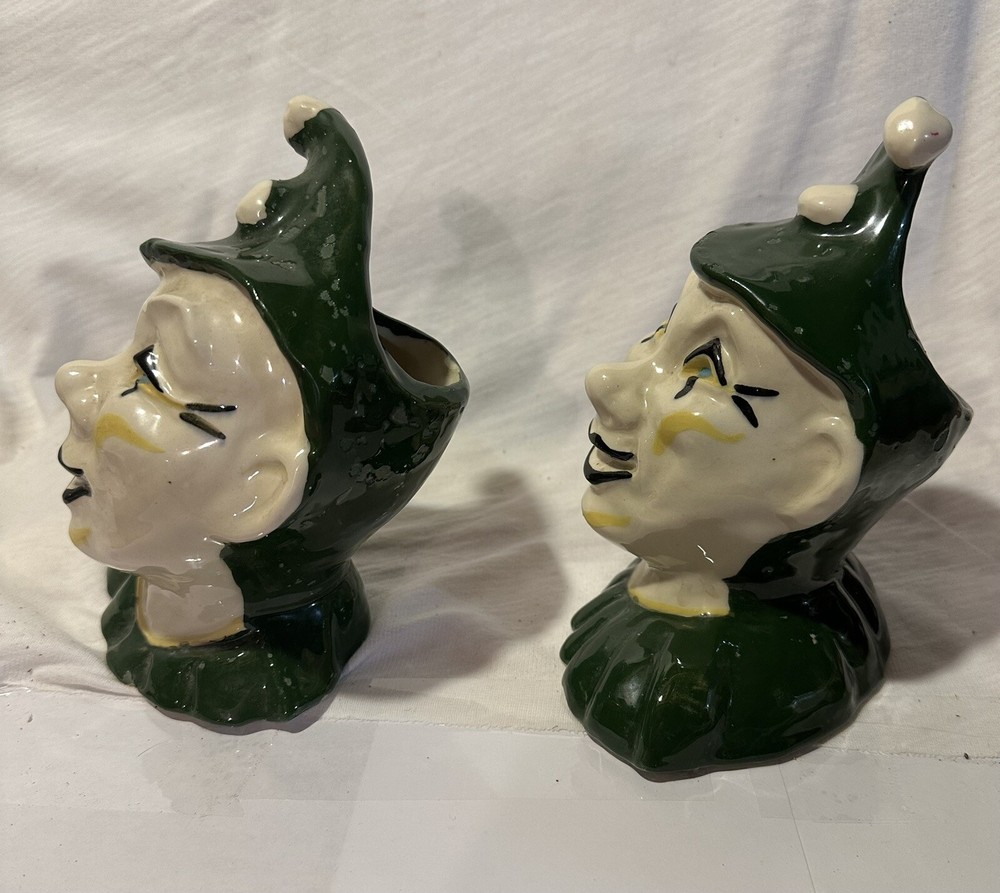2 ceramic Jester planters.