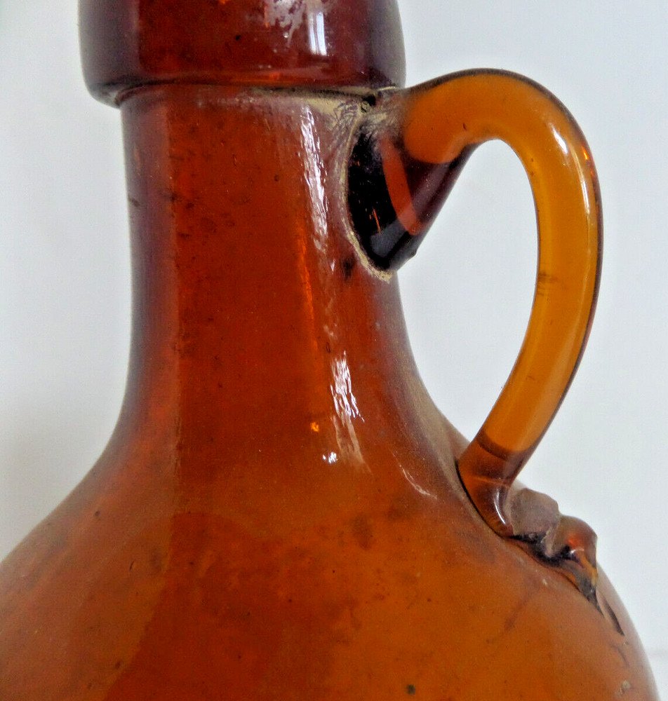 brown glass bottle applied handle antique EMPTY