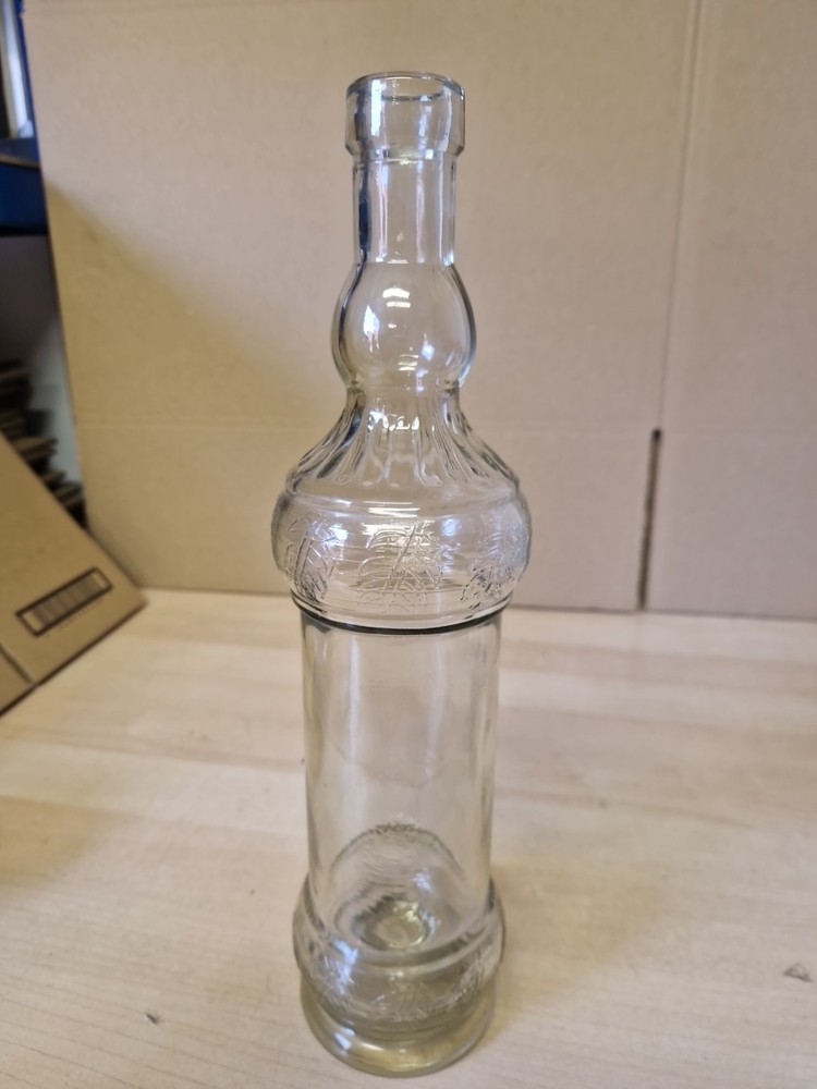 Vintage Clear Glass Bottle With Embossed Leaf Pattern 32.5cm Tall