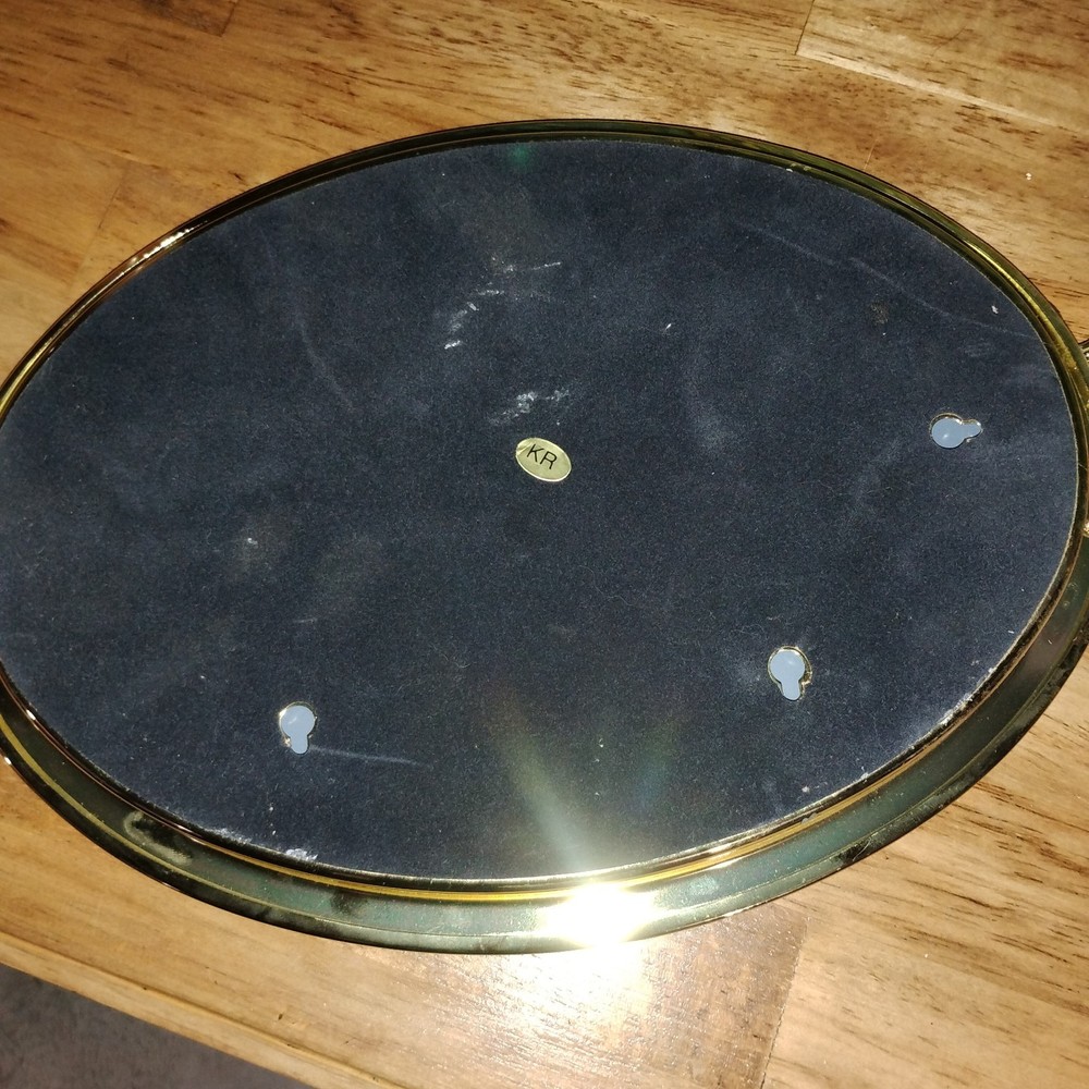 Vanity Bath Mirror Gold Oval with Bow Handles. Hangable
