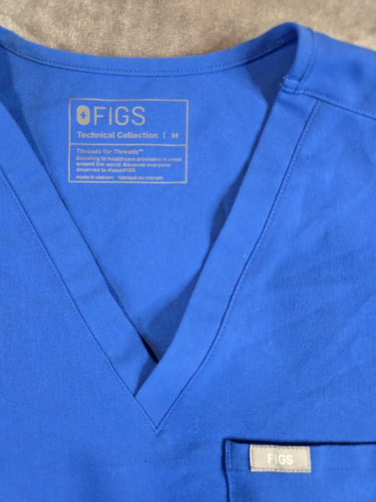 FIGS Technical Collection One Pocket Scrub Top Womens Medium Blue