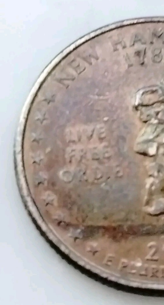 2000 P New Hampshire Quarter Stained Over