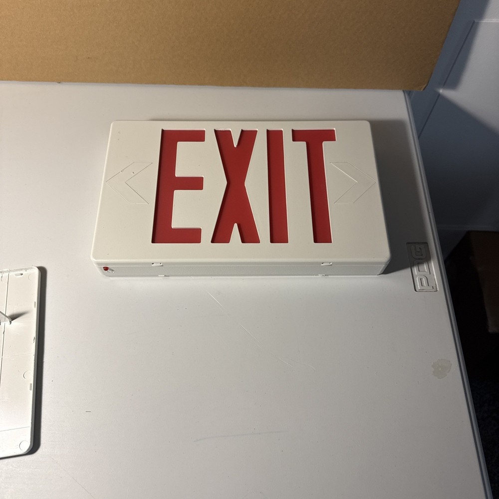 Red Light White Housing Battery Back Up Exit Sign.