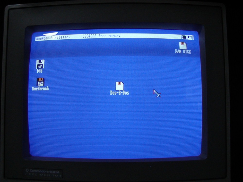 Commodore Amiga DOS 2 DOS, (1) Original Master with Manual in Plastic Folder