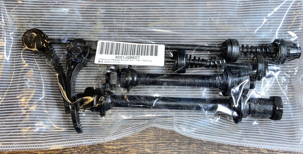 Quick-release hub conversion kit. 117-143 total length for 100-135 spacing
