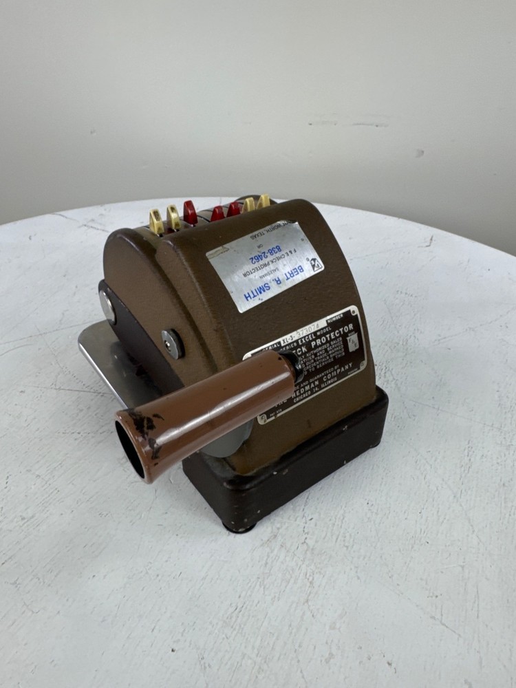 Hedman Company Model XL F&E Check Protector