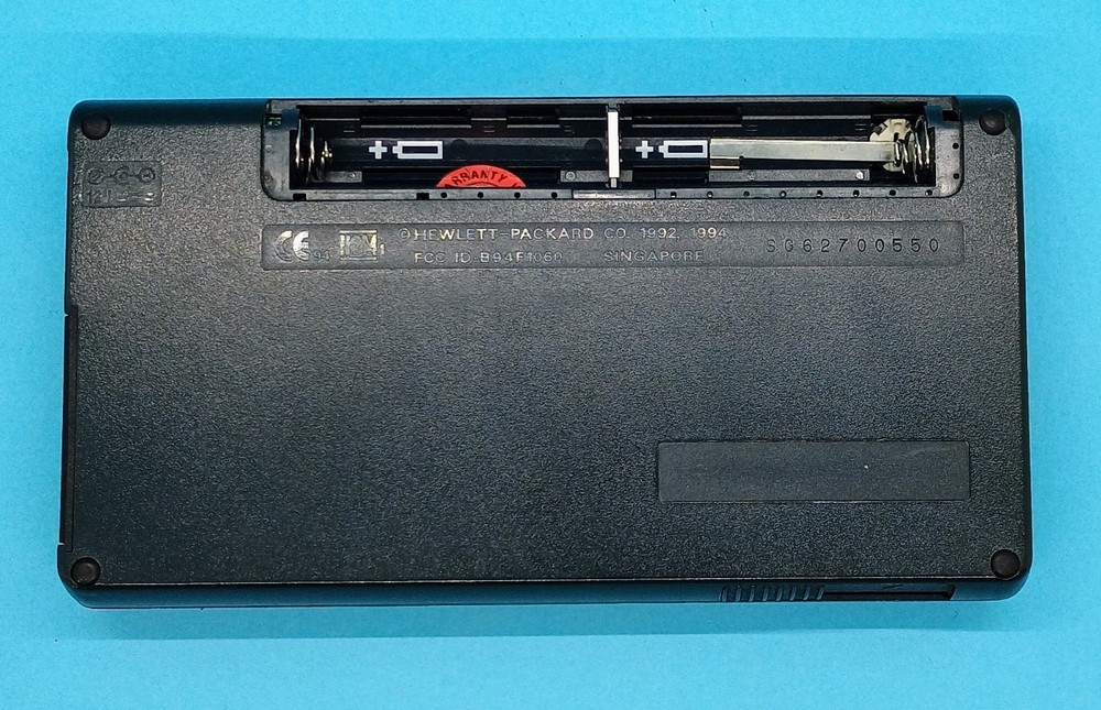 Vintage HP 200LX Handheld Graphic Display PC Palmtop 2MB Powers On