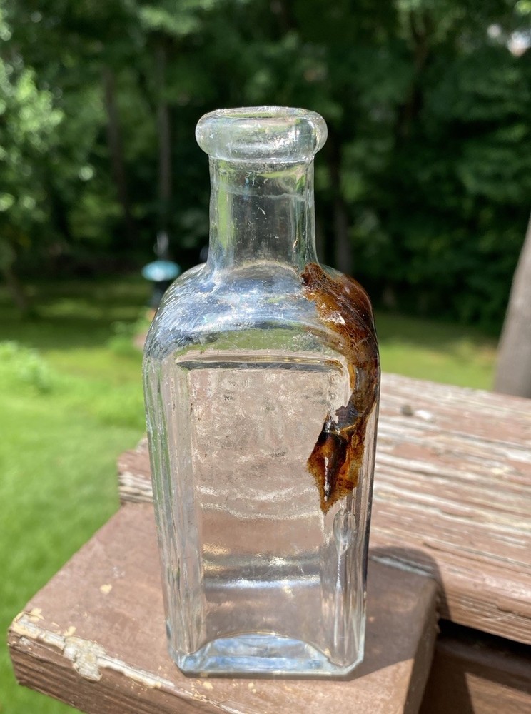 The Singer Sewing Machine Co Bottle