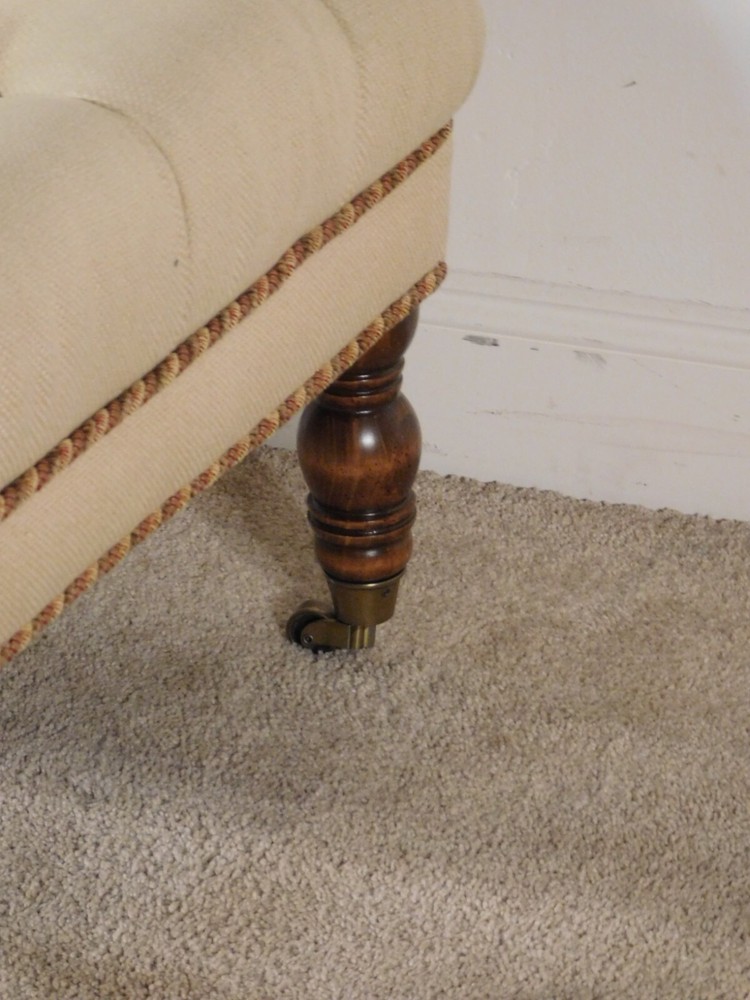 HENREDON Deep Tufted Ottoman Footstool on Heavy Brass Casters