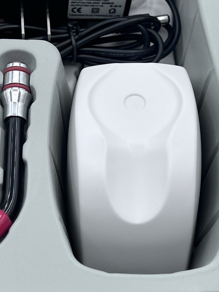Dental 5W induction wireless curing light has dental caries detection function