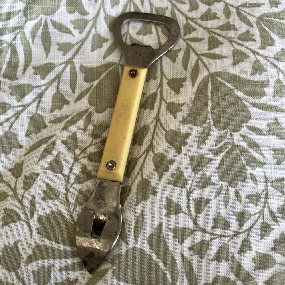 Vintage Bottle Opener USA Bakelite Handle?