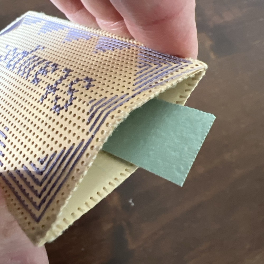 antique paper punched needlework stamp holder - 2 sided