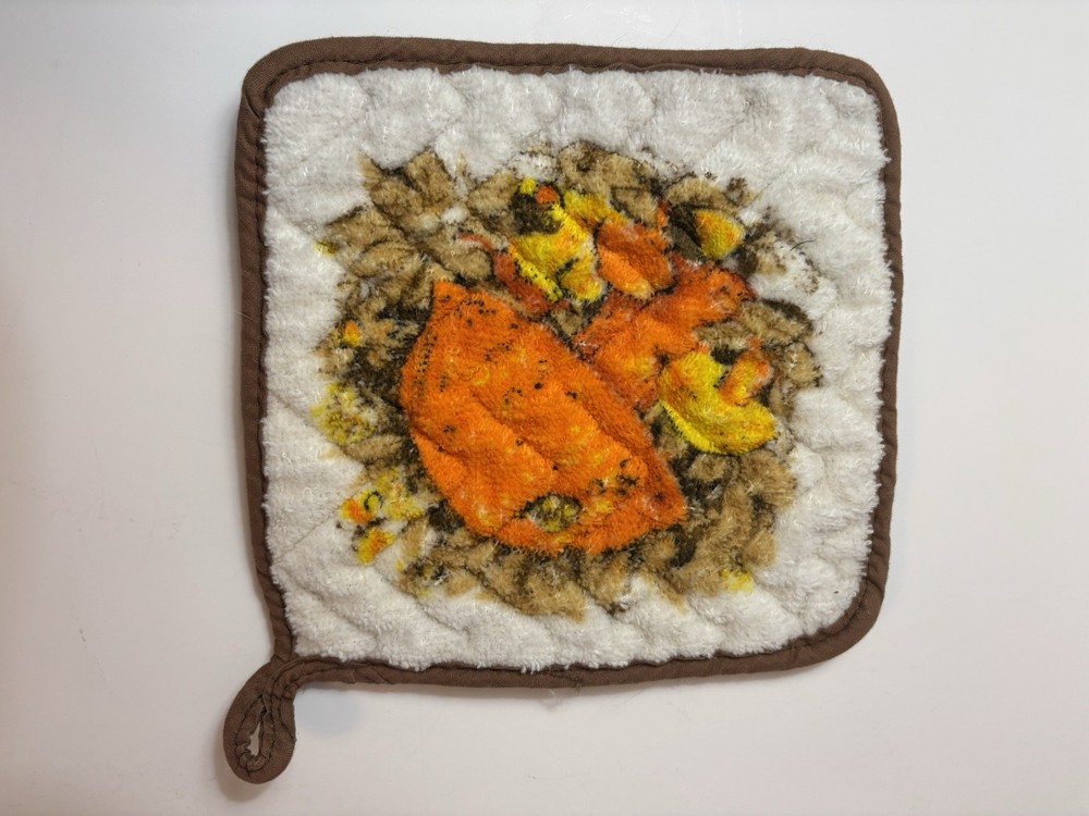 7 Potholders And Mittens In A Basket