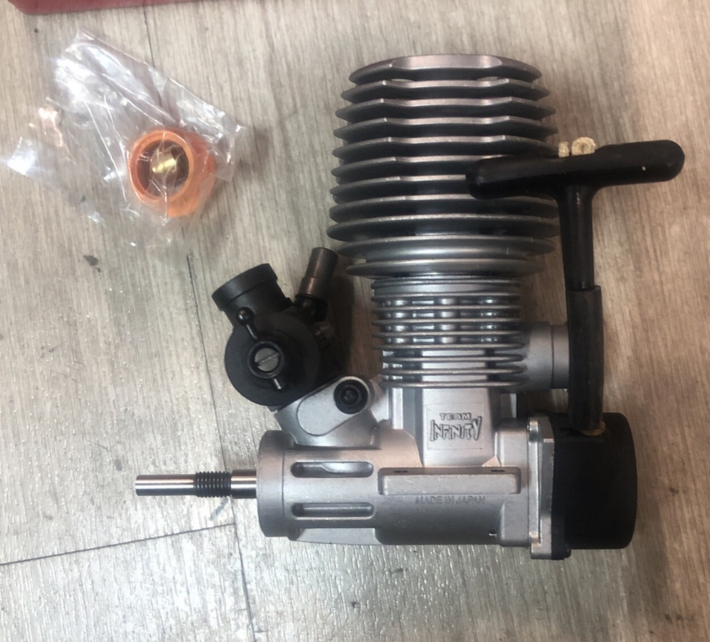 Toki Engine High performance, 21 slide carb, SG crank rear exhaust pull start