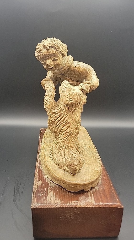 Boy And Dog Clay Sculpture