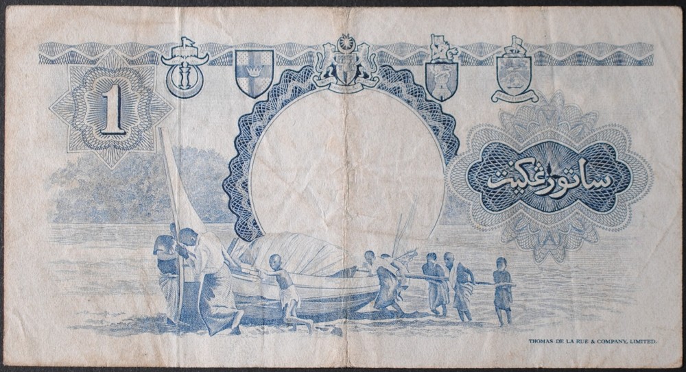 Malaya and British Borneo P8A Dollar VF