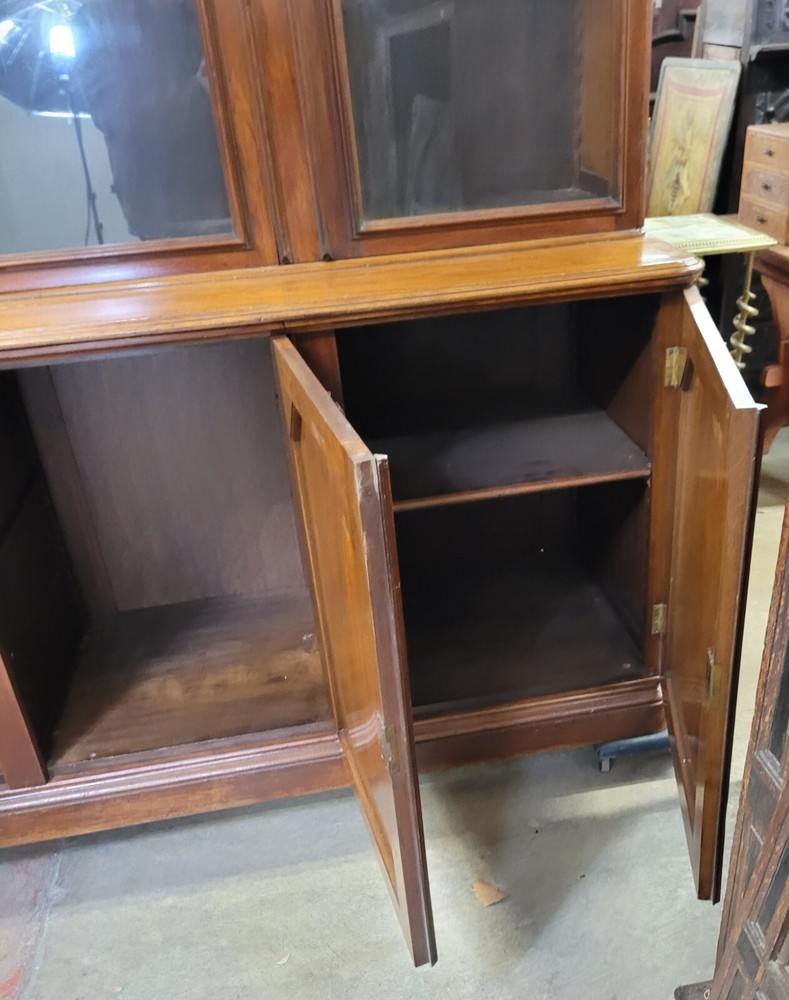 EXCEPTIONAL AMERICAN VICTORIAN WALNUT AND BURL BOOKCASE