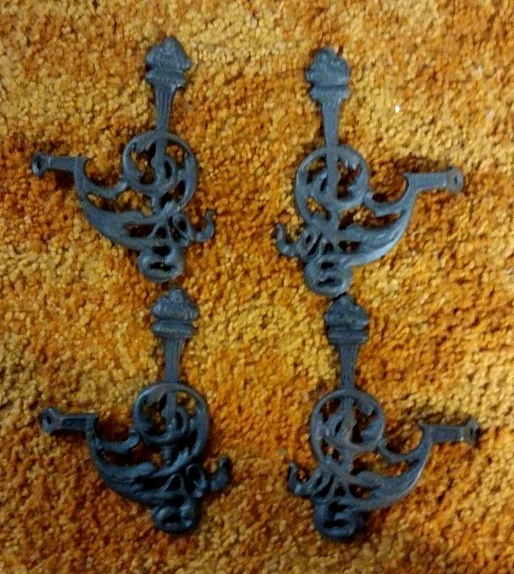 ANTIQUE CAST IRON (4) COAT TREE HOOKS WITH TORCHES ORNATE