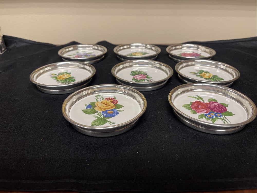 Rogers silver Company coasters with floral display