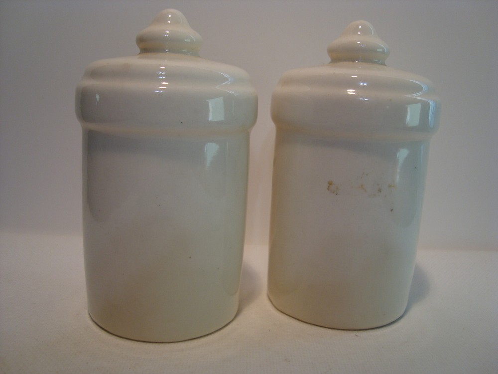 Large white porcelain floral pattern salt & pepper shaker set.