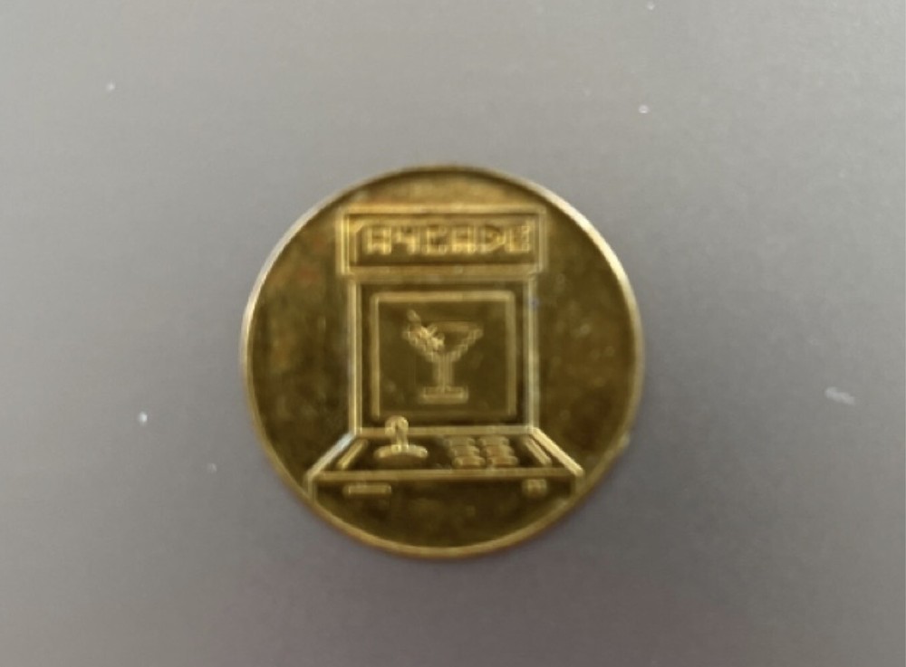 vintage arcade token Roxy's Cambridge, Massachusetts