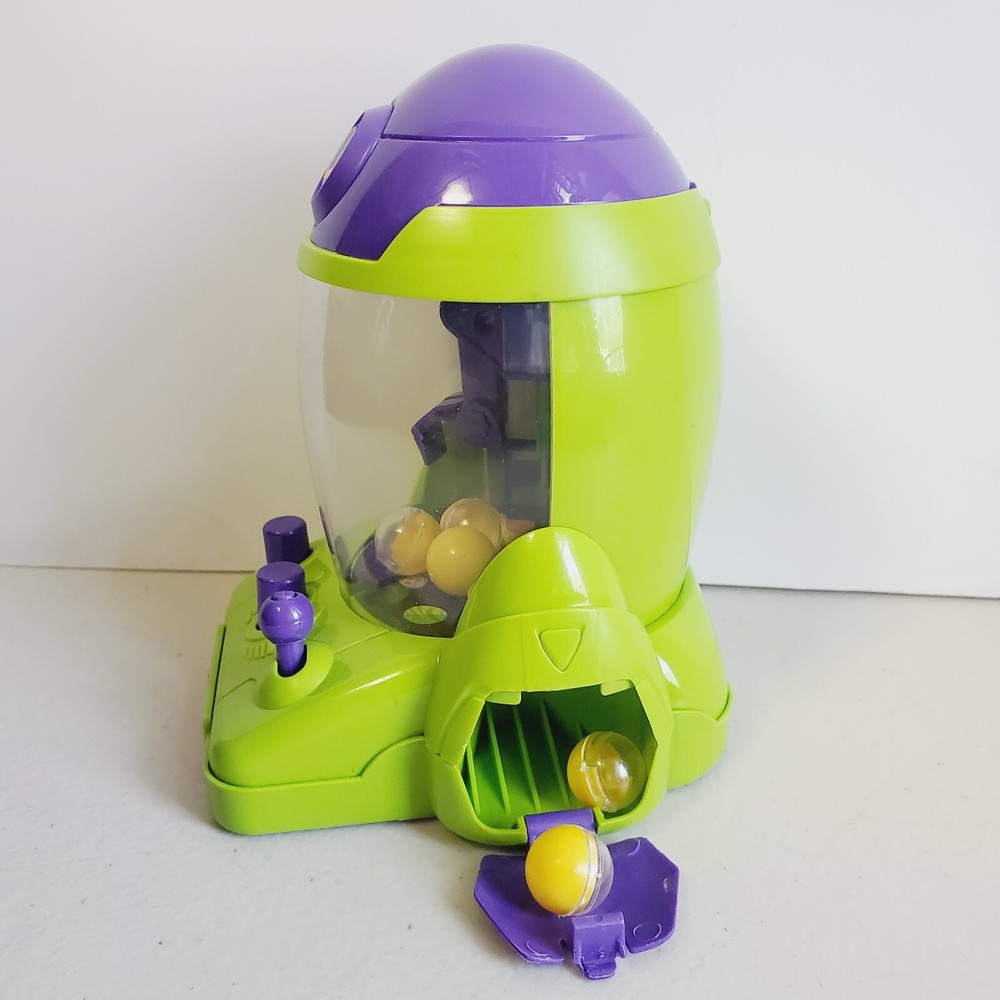 Mini Crane Game Machine. Space Rocket Ship. Handheld. W Opening Balls. ONLY 5" T