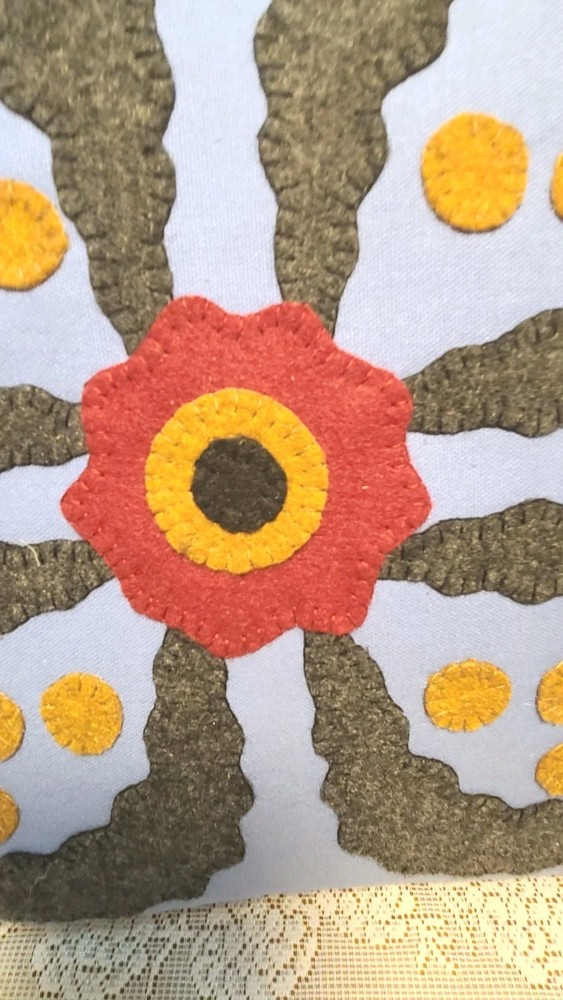 Large symmetrical floral Throw Pillow Crafted through Applique' Pattern