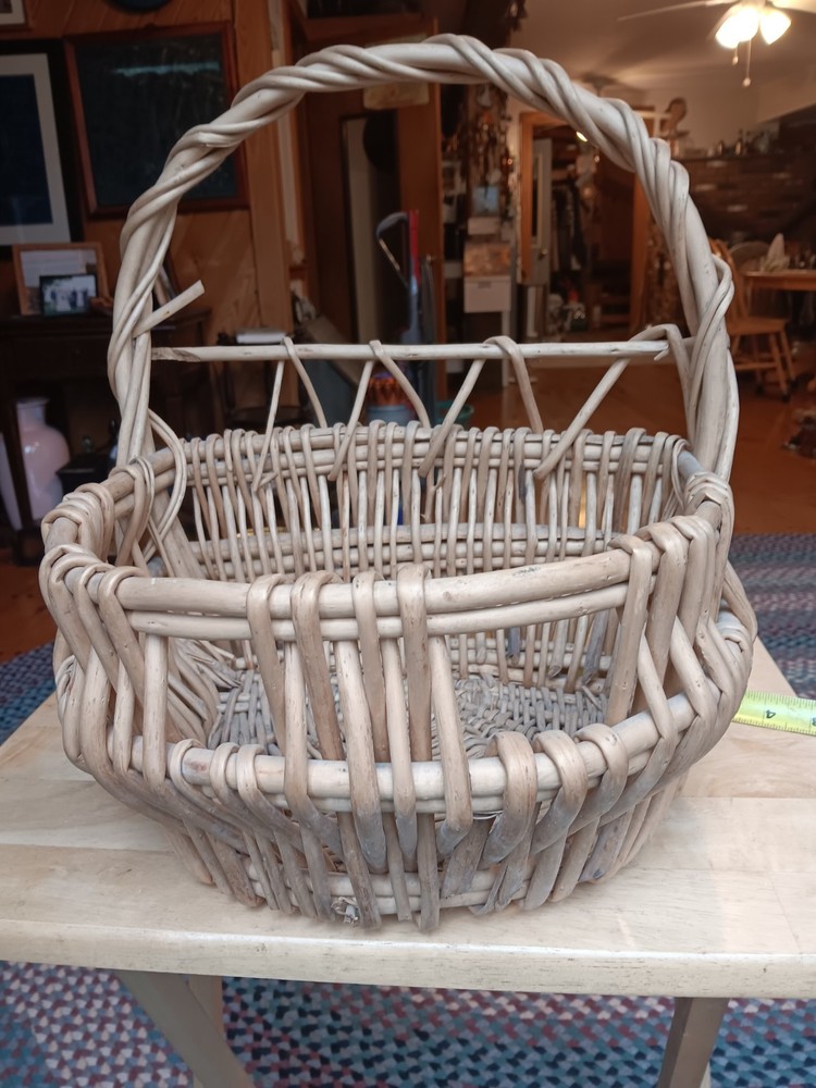 large woven wicker handled pocket basket. 727