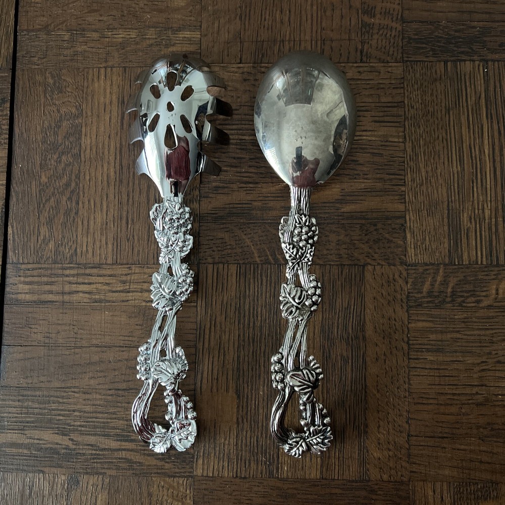 Two ornate serving utensils