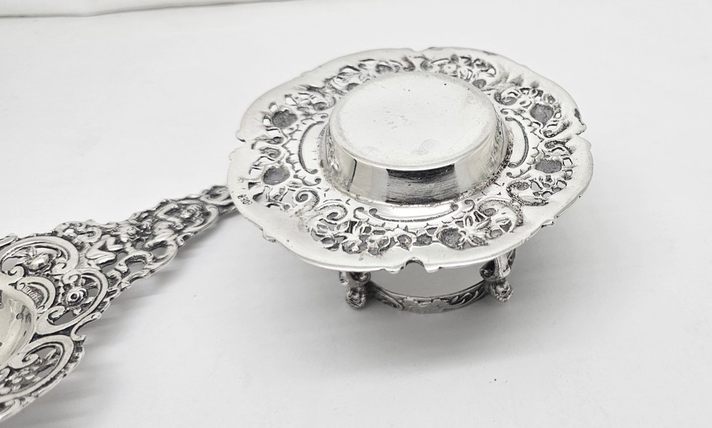 ORNATE CHERUB & FLOWERS 830 SOLID SILVER OTC TEA STRAINER W/DRIP STAND