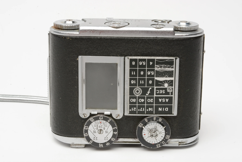 Tessina subminiature compact camera, tested, works great, w/strap