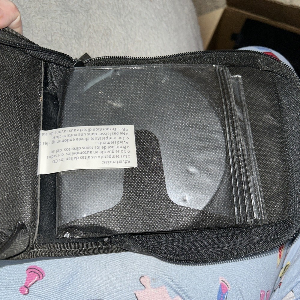 8 Assorted CD/DVD Cases