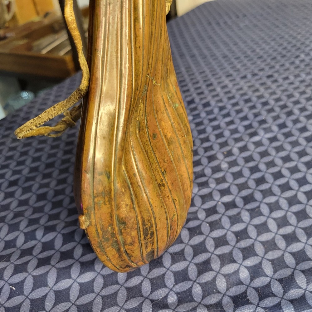 1800's original powder flask large dent on front. tip may be missing.