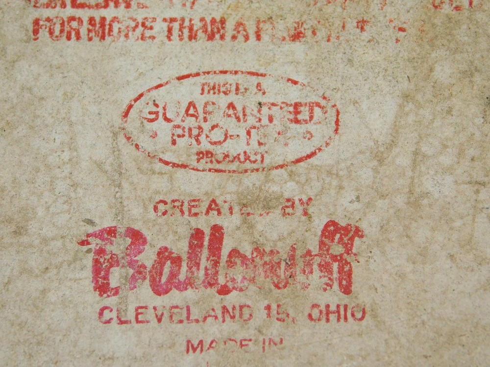 VINTAGE KITCHEN 8 3/4" HIGH SILVER SHIELD IRON REST