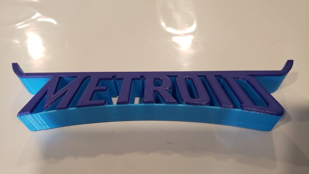 Nintendo Wii U Horizontal Display Stand with Metroid Title 3D Printed