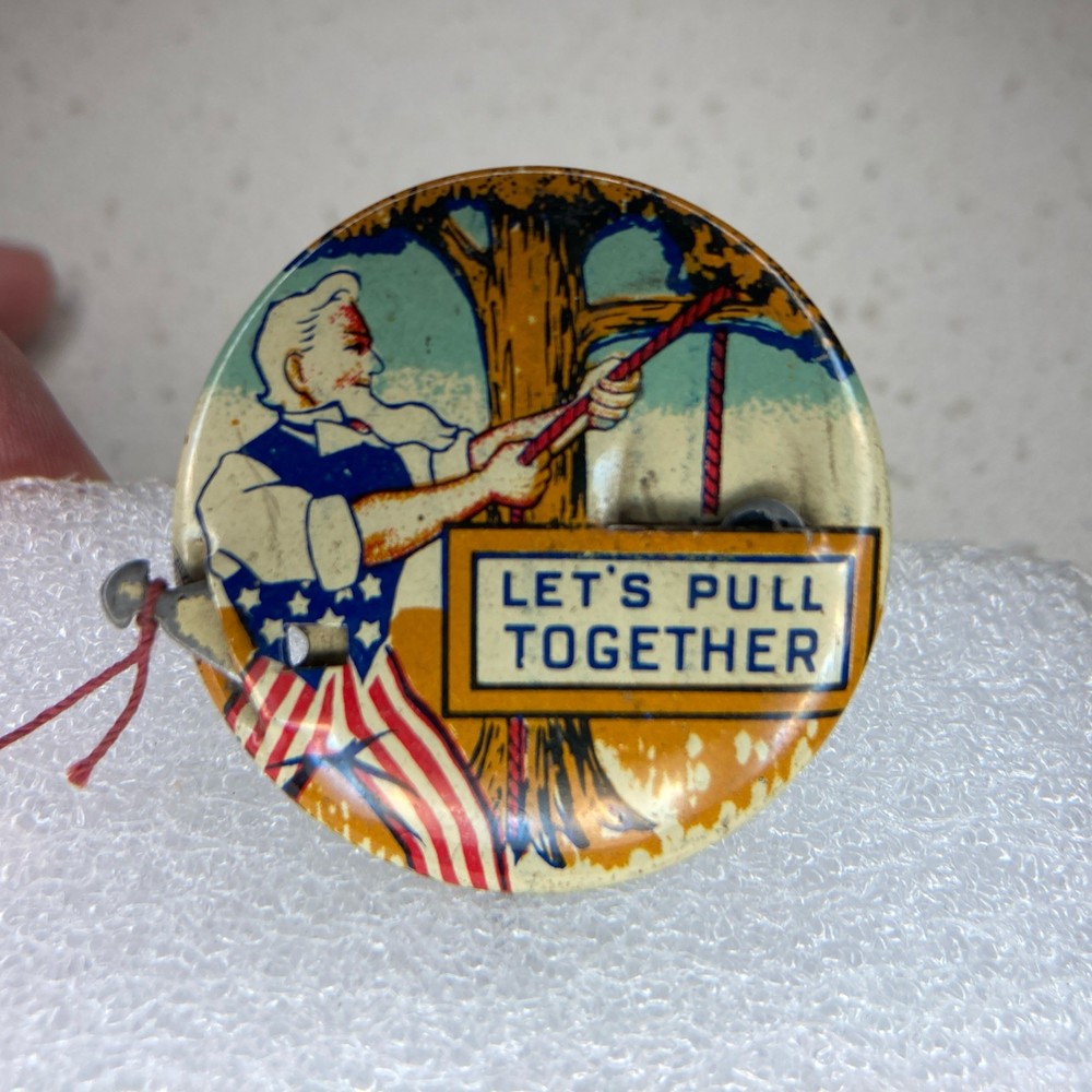 Vintage WWII Uncle Sam LET’S PULL TOGETHER Propaganda Mechanical Pinback Button