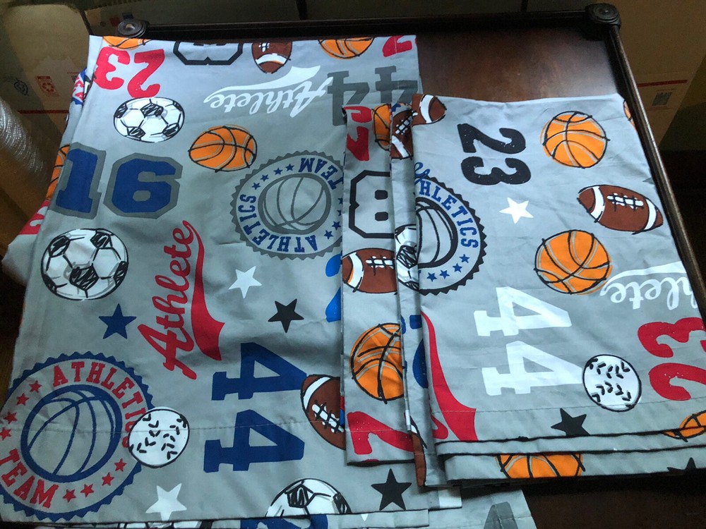 Two ￼Sports themed table runners 84x 30