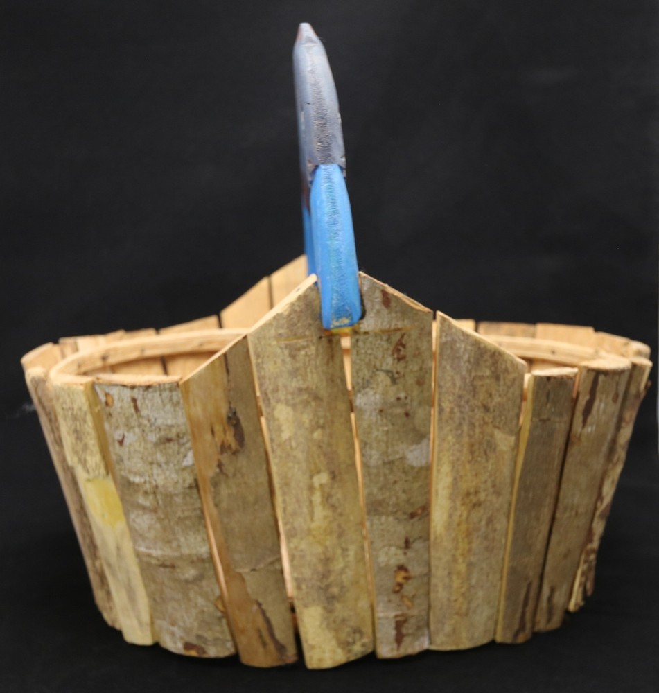medium-sized oval storage basket features a wood fish handle