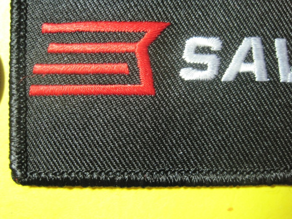 SAVAGE ARMS FIREARMS LOGO VEST PATCH 2 X 4 INCH HOOK BACK GUN EMBLEM SHARP!