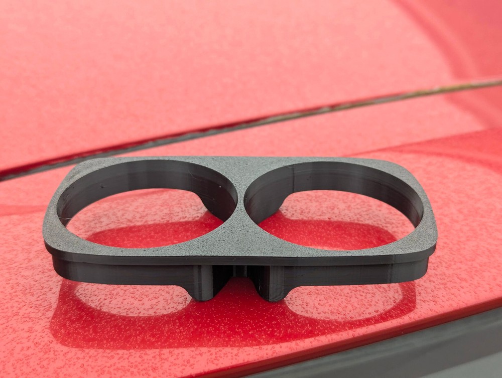 Cup holder insert for Suzuki Swift 2005-2010.