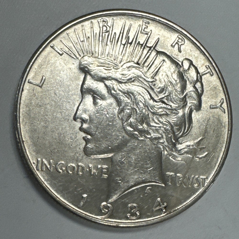 1934-D $1 Peace Silver Dollar AU.