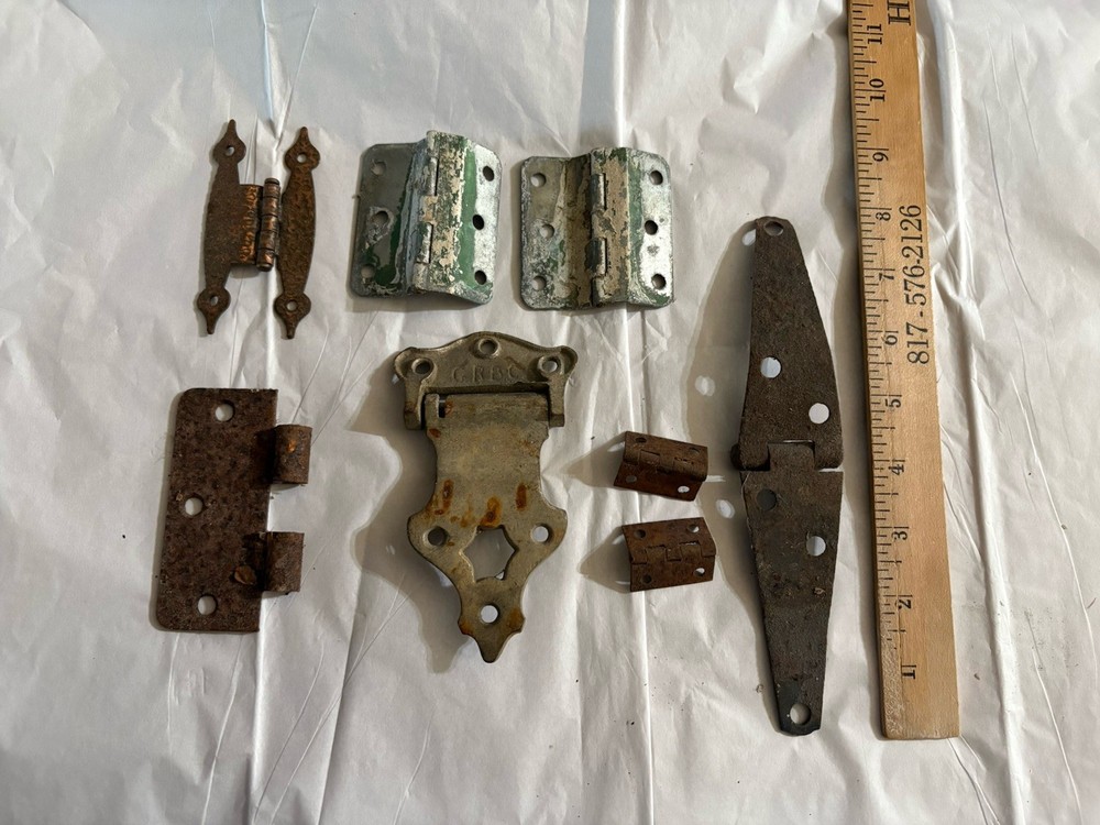 Eight vintage hardware hinges