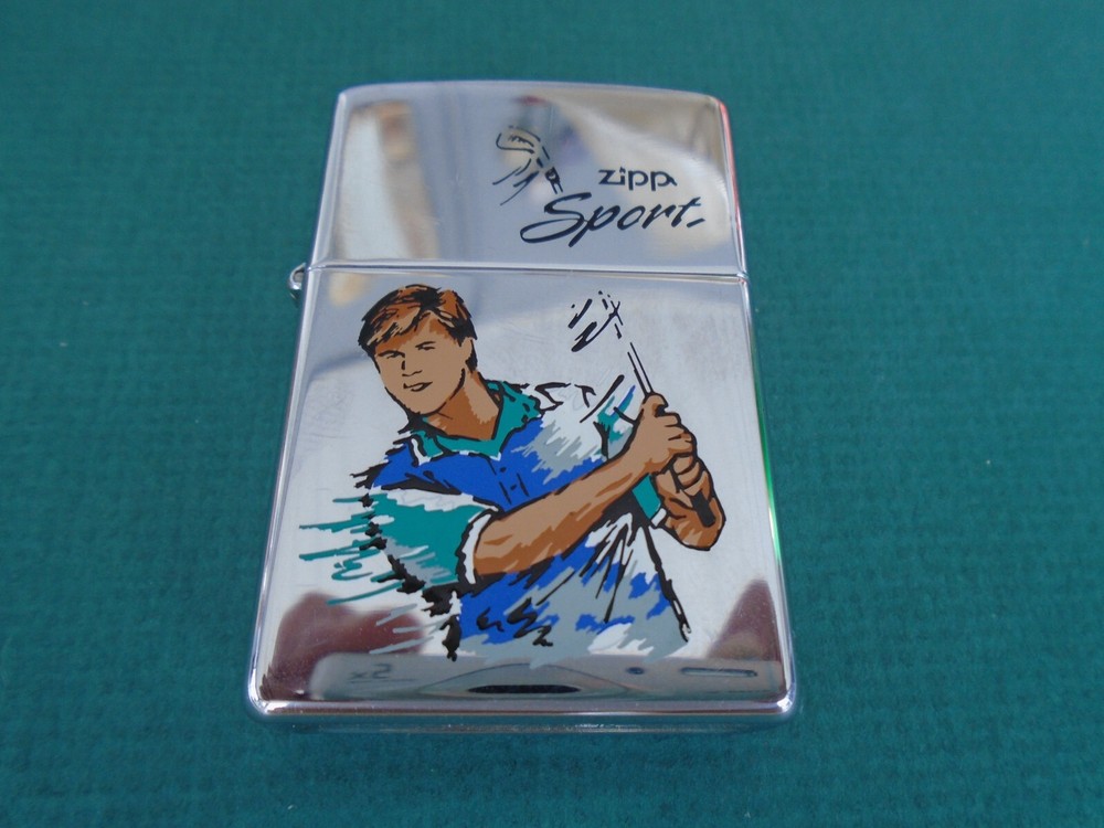 Zippo chrome lighter with golfer logo