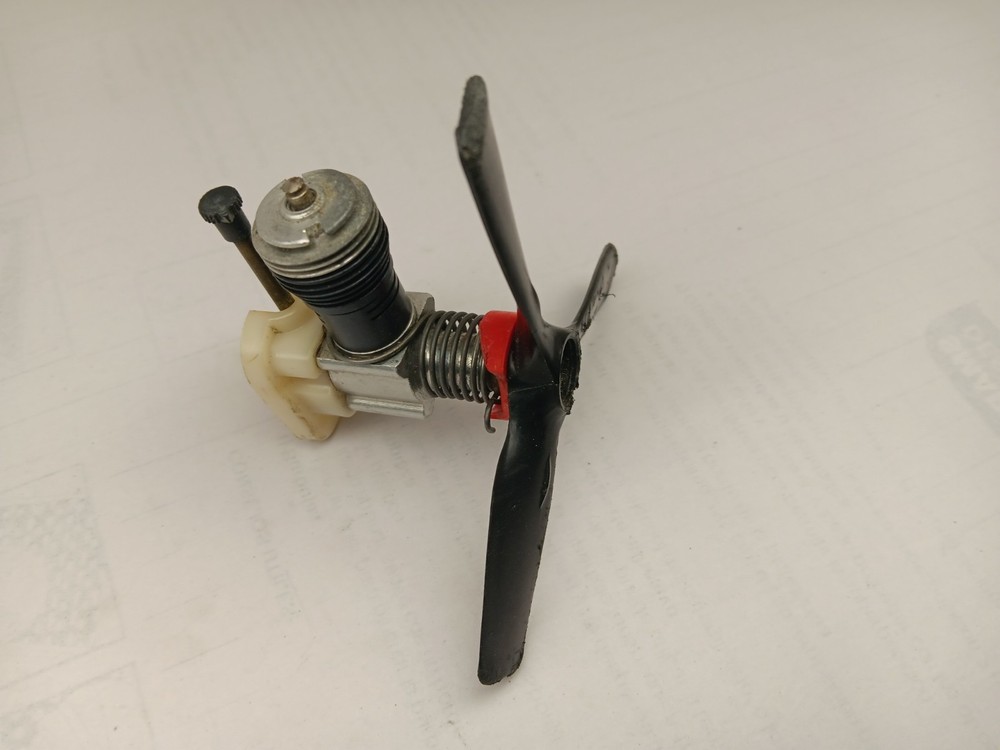 Vintage COX Product Engine with Two three Prop & Spring Model Engine