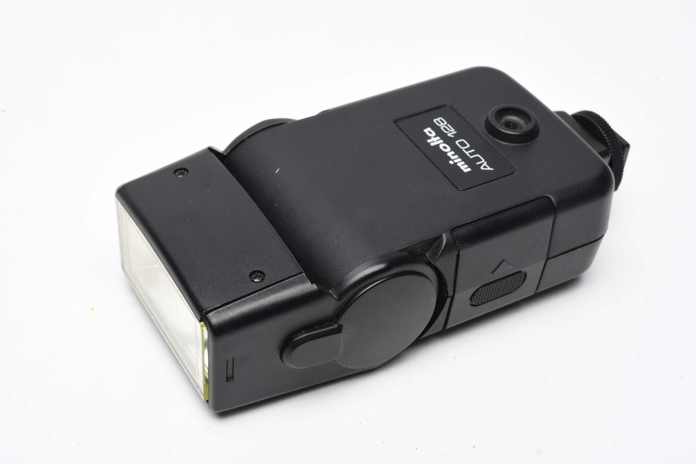 Minolta Auto 128 electronic flash, nice & clean, tested, w/Case+Manual