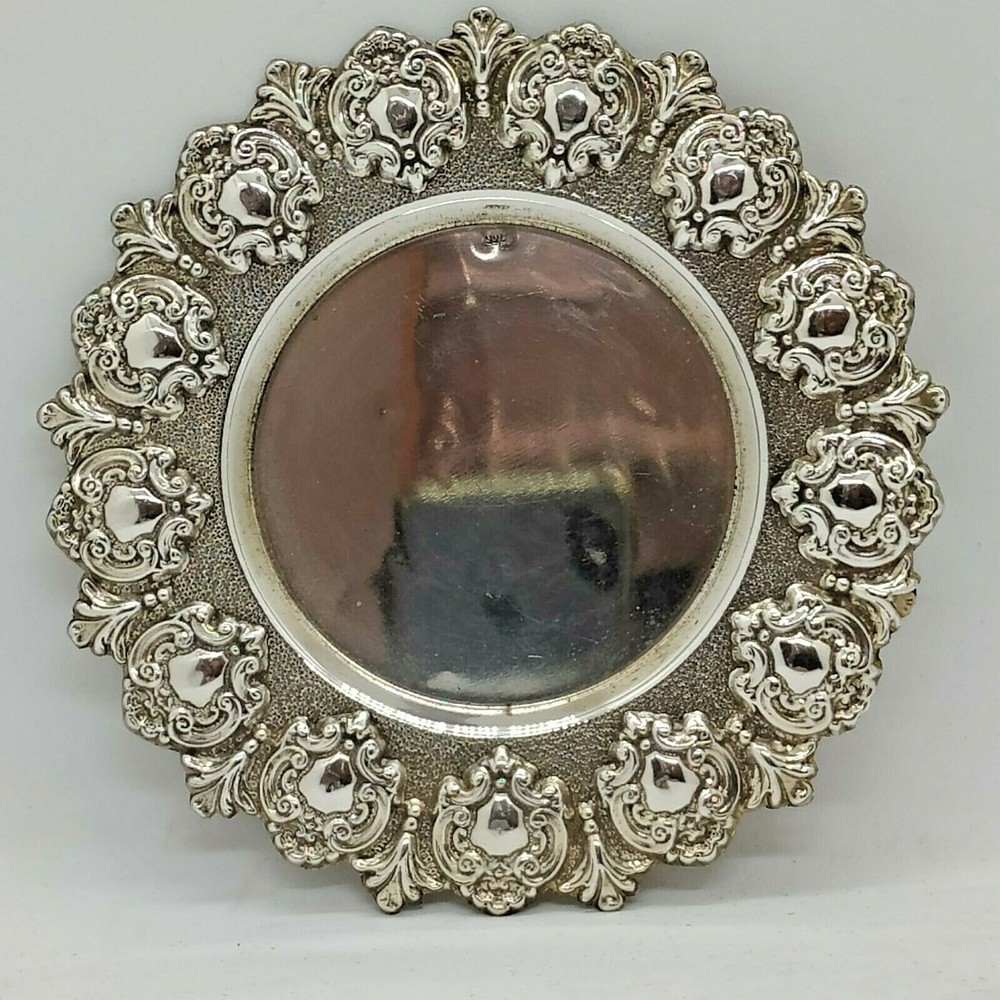 Handmade sterling silver Kiddush cup saucer embossed designs around dish edges
